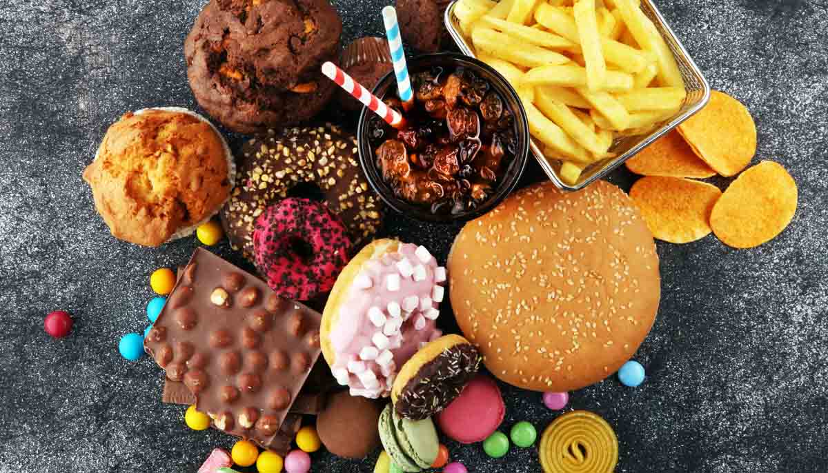 Junk Food spread showcasing french fries, burgers, candy, etc