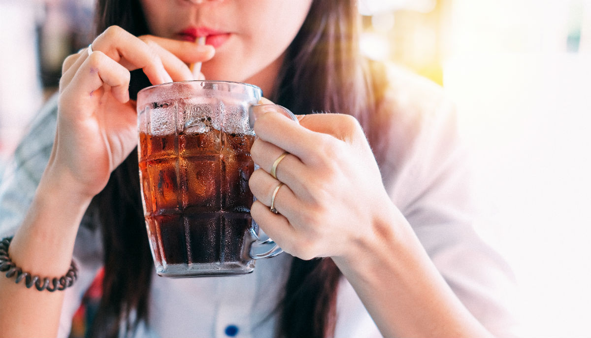 Woman drinking soda