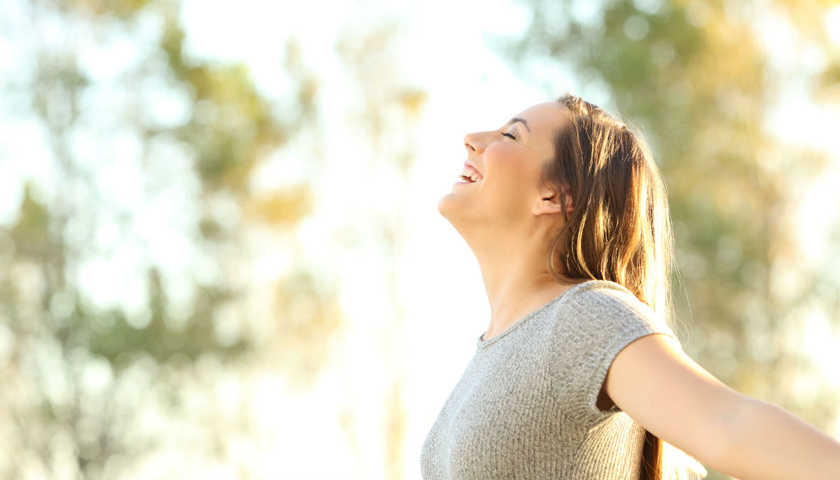 woman-smiling-in-sun