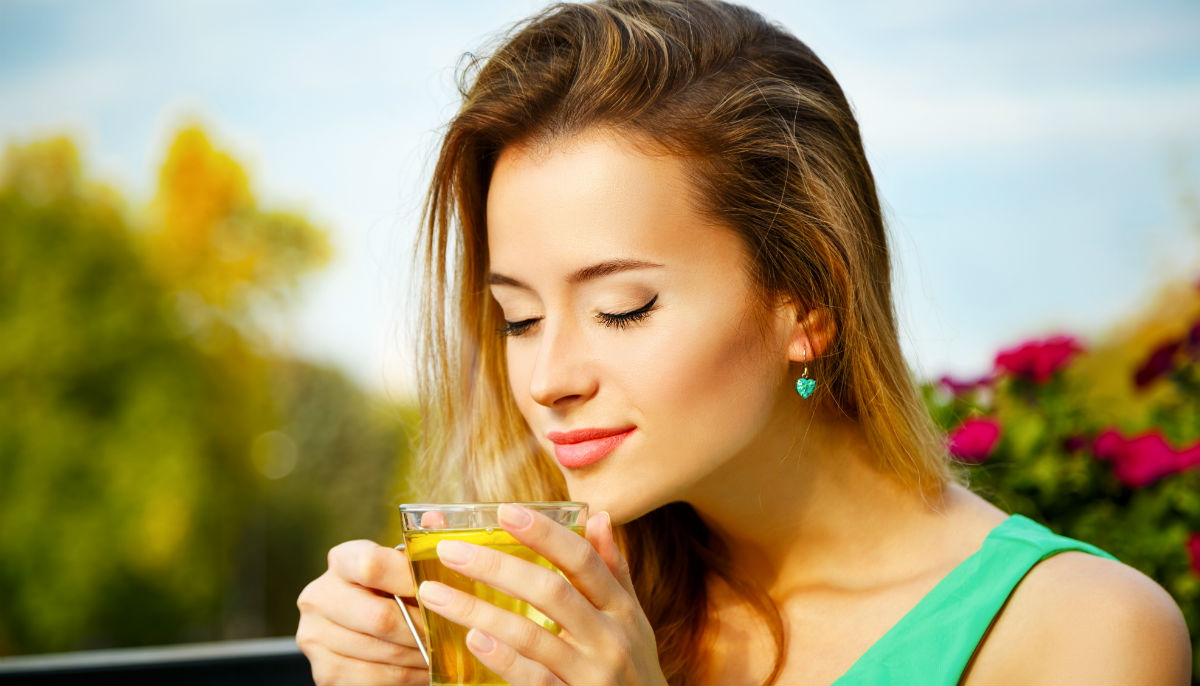 woman drinking green tea