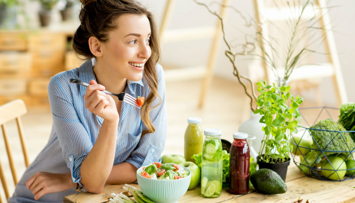 woman eating salad